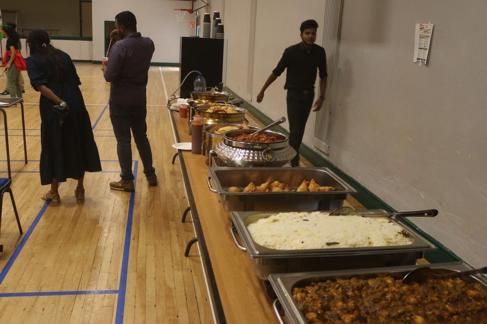 Buffet counter with Indian dishes served at the event